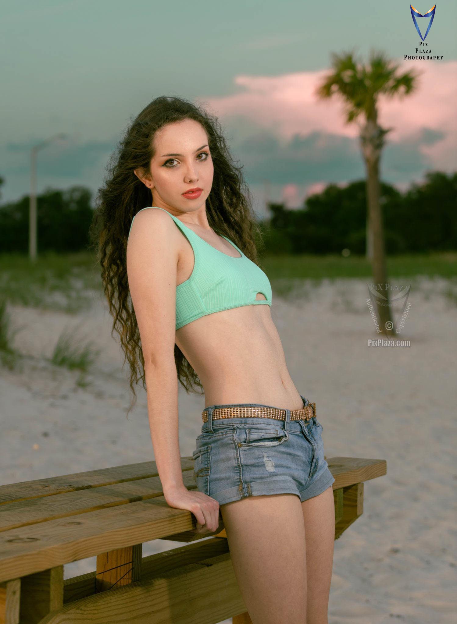 Teen model posing on the beach