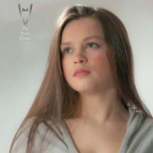 Girl posing looking towards the ceiling